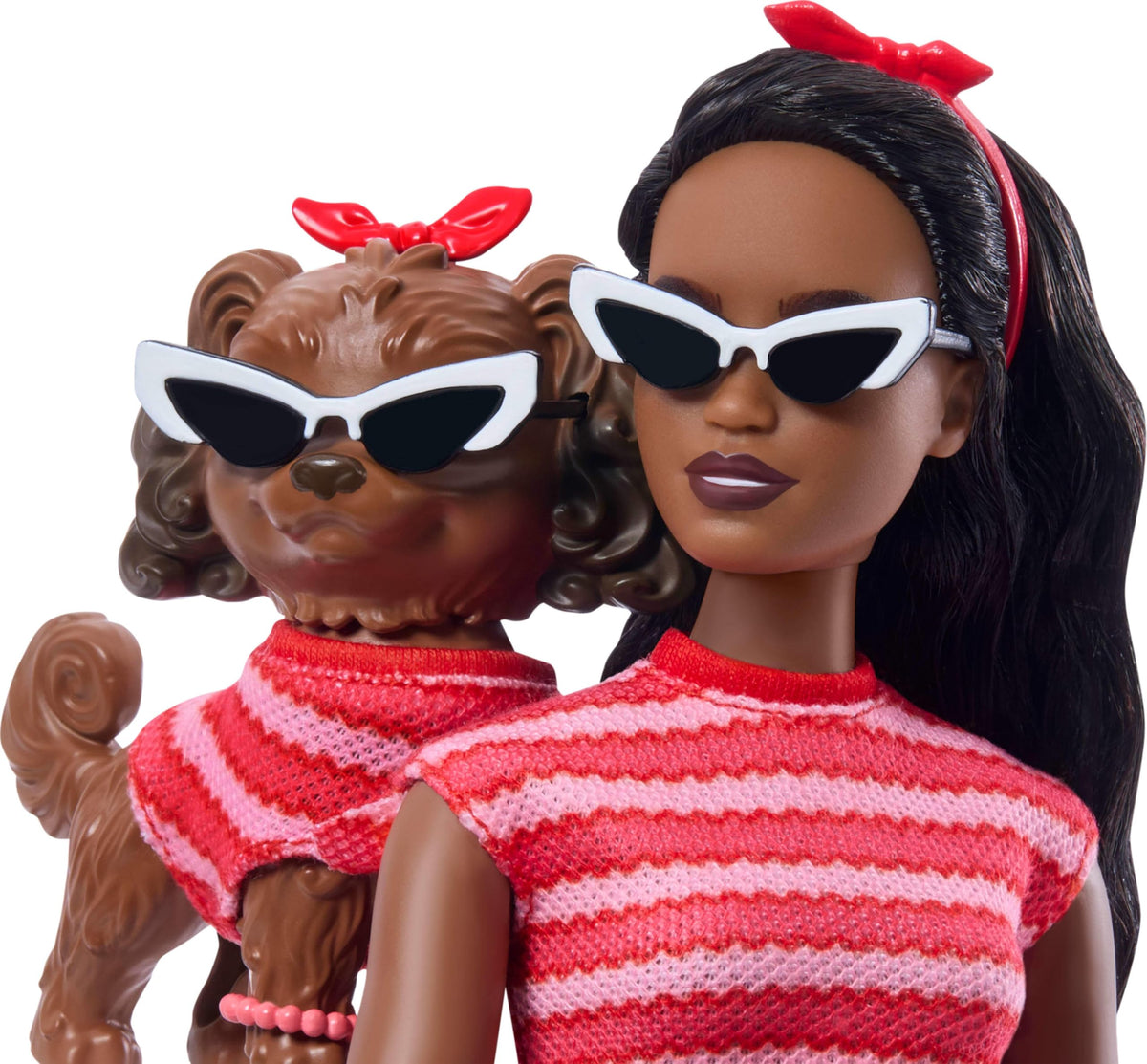 Barbie Twinning Looks red-striped dress detail highlights coordinated fashion moments.