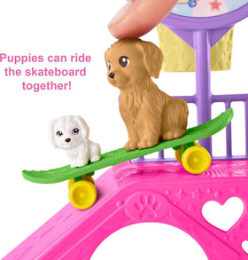 Barbie Chelsea with two puppies on skateboard for cooperative fun.