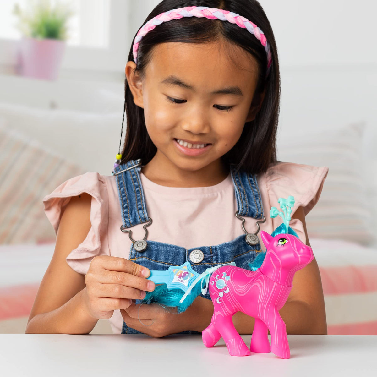 Basic Fun Aurora Celestial Pony with commemorative 40th anniversary comb