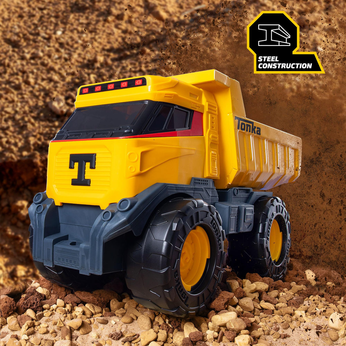 Tonka Next Gen Mighty Dump Truck articulated steel dump bed enables realistic loading play.