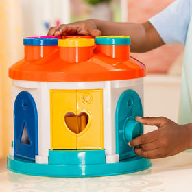 Battat Shape Sorter House storage keeps pieces tidy after play.