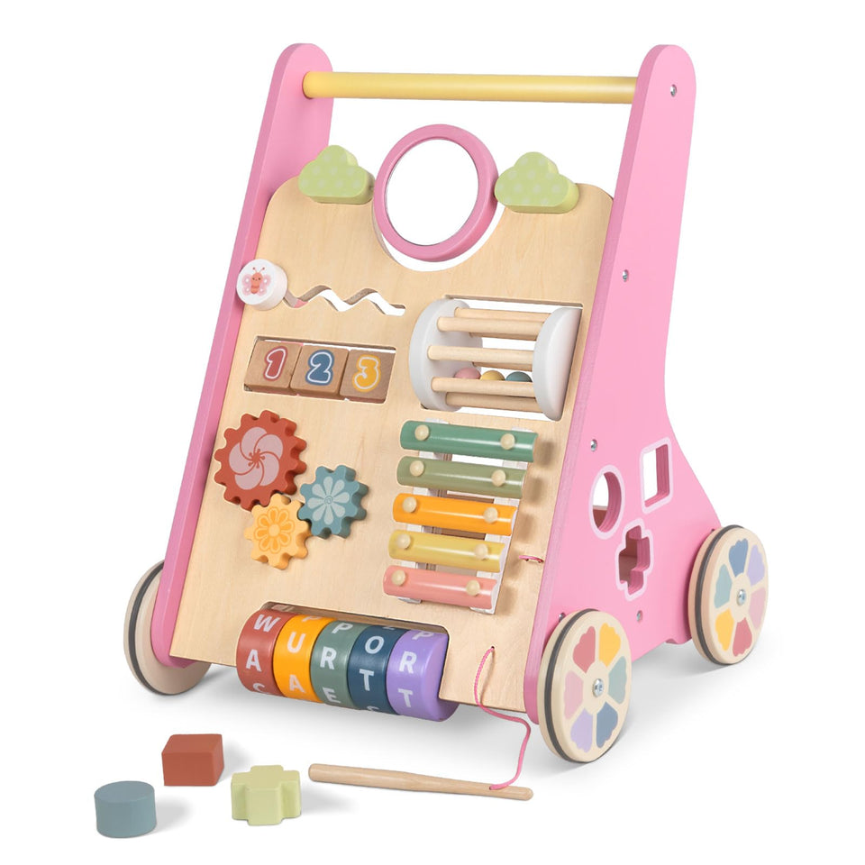 Bautia wooden baby walker with panel supports balance during first steps.