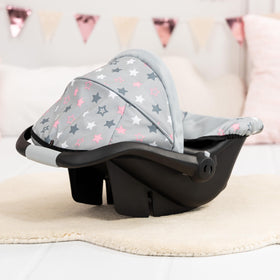 Bayer car seat offers a soothing rocking motion during pretend travel.