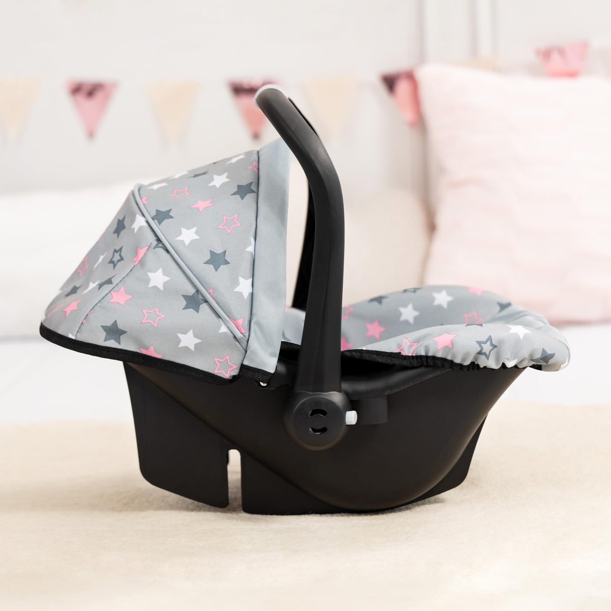Bayer car seat with retractable sun canopy protects the doll from sun and wind.