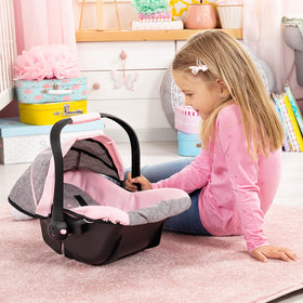 Butterfly detail adds playful style to Bayer Design Easy Go car seat.