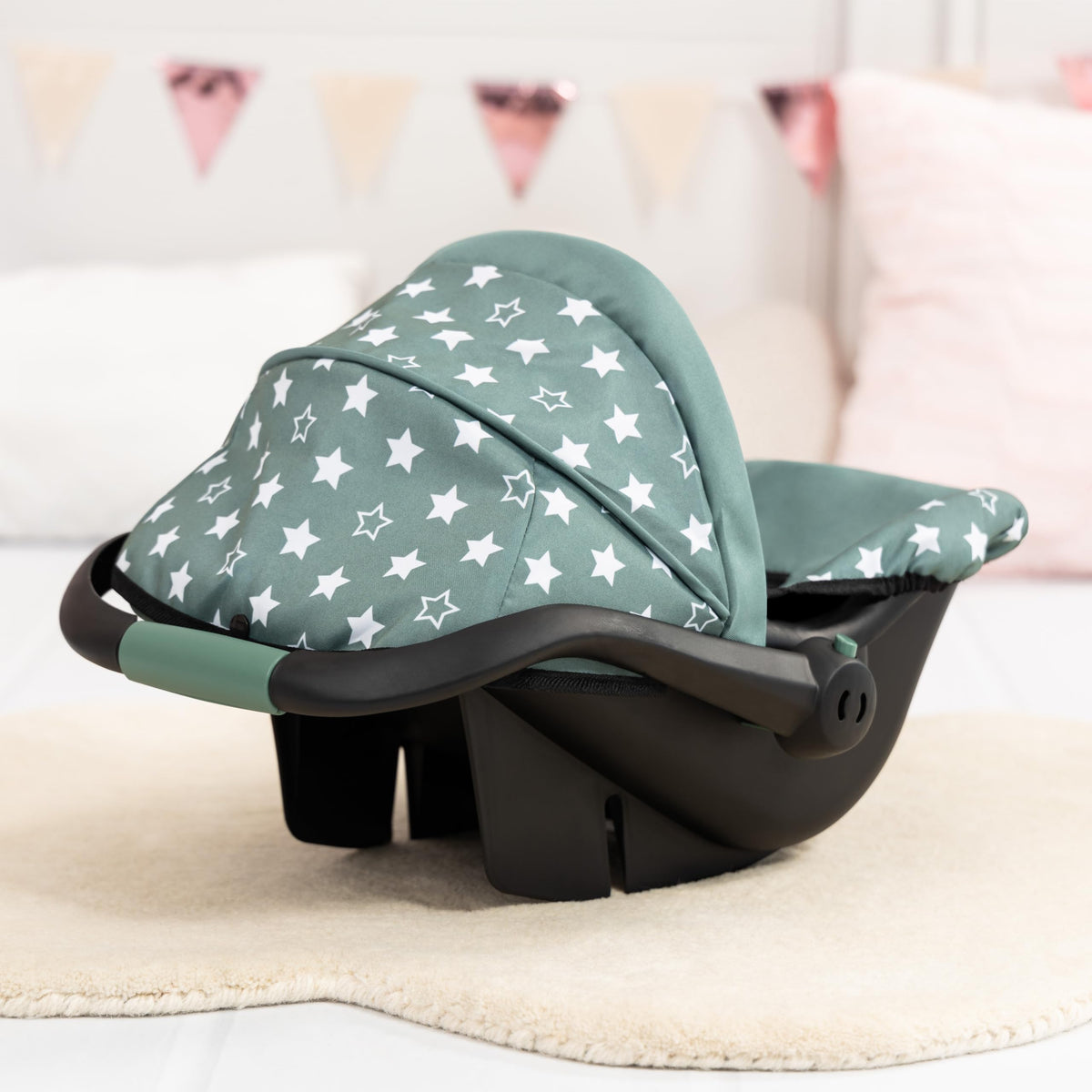 Bayer Design Deluxe Car Seat sun shade canopy protecting a doll during play.