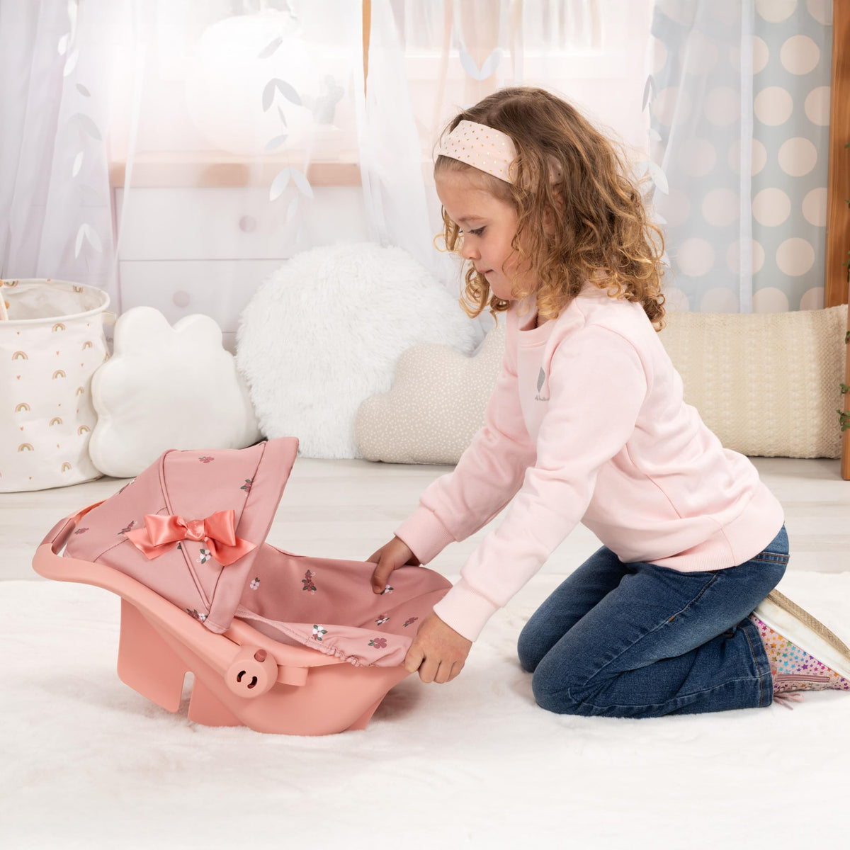 Bayer Design Deluxe Doll Car Seat ergonomic carry handle for easy transport by kids.