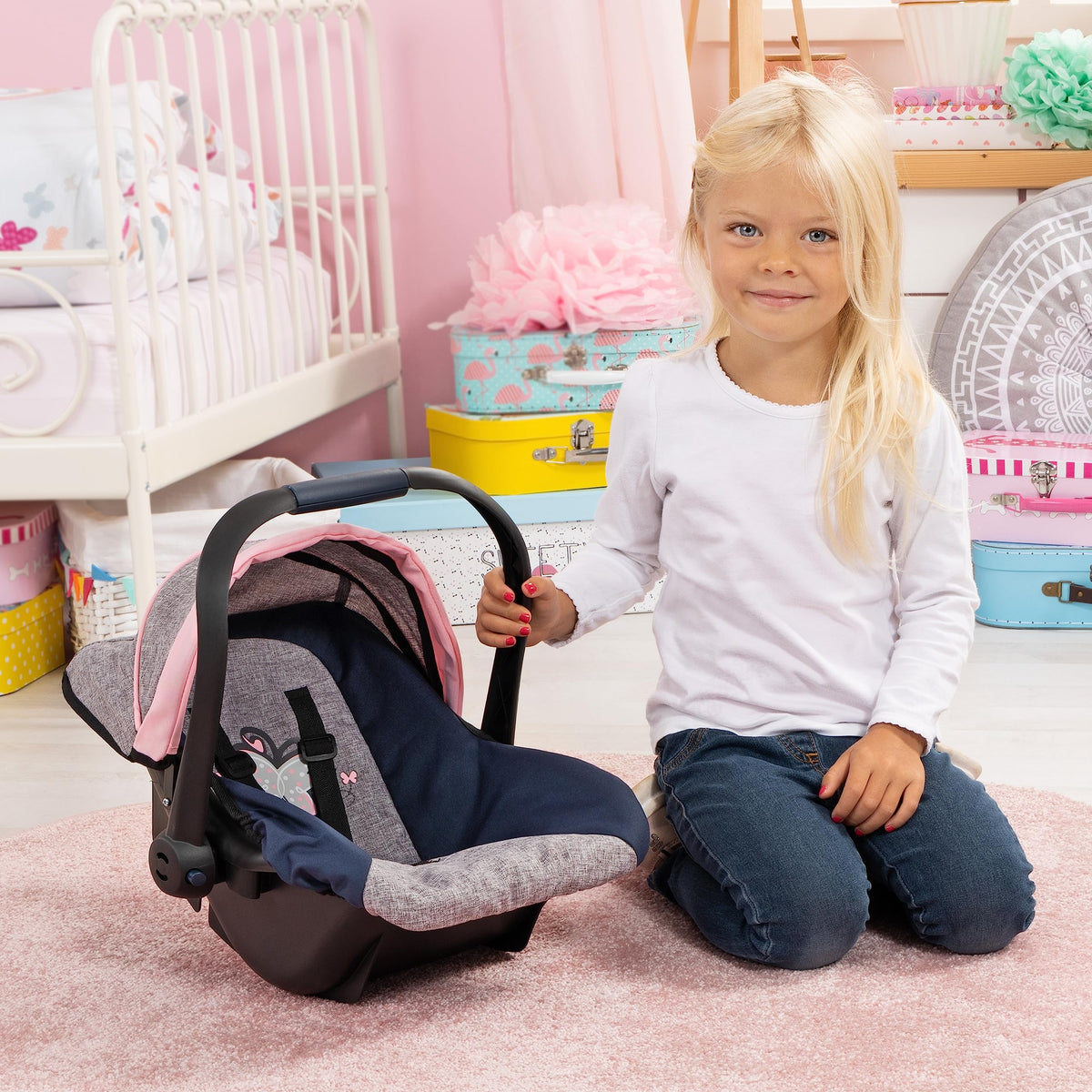 Ergonomic handle on Bayer Design Dolls car seat for easy carrying