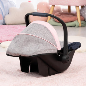 Pink butterfly Bayer Design Dolls car seat adds playful charm