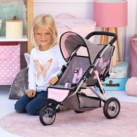 Bayer Design Dolls Twin 3 Wheel Jogger folded for compact storage.