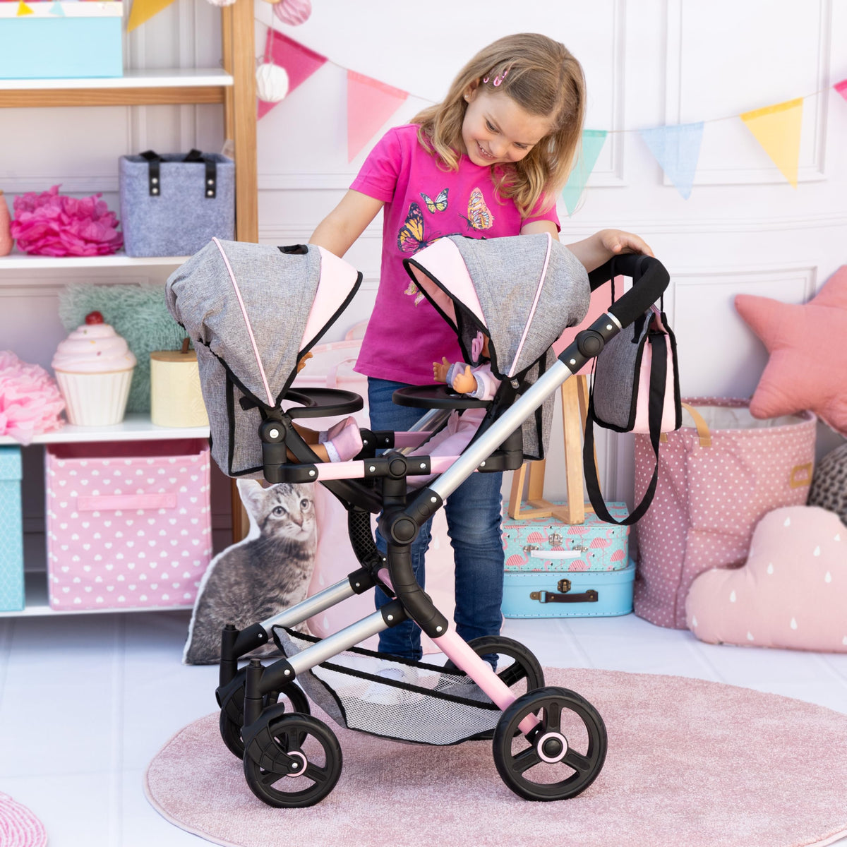 Bayer Twin Doll Pram Neo integrated shopping basket keeps doll accessories organized.
