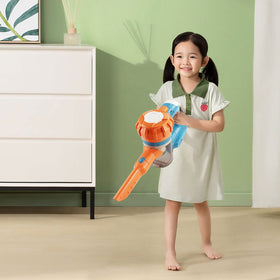 Baymi 3-in-1 kids vacuum shown in use on a playroom carpet.