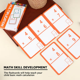 Bazic Products flash cards with bold numerals readable from across the desk.