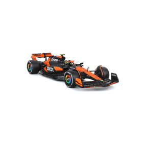 Bburago 1:24 McLaren MCL38 helmet detail enhances realism.