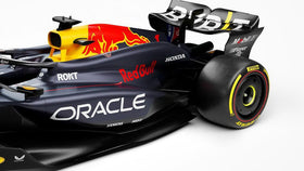 BBurago Red Bull RB20 1/43 rear-angle shot showing sponsor decals.