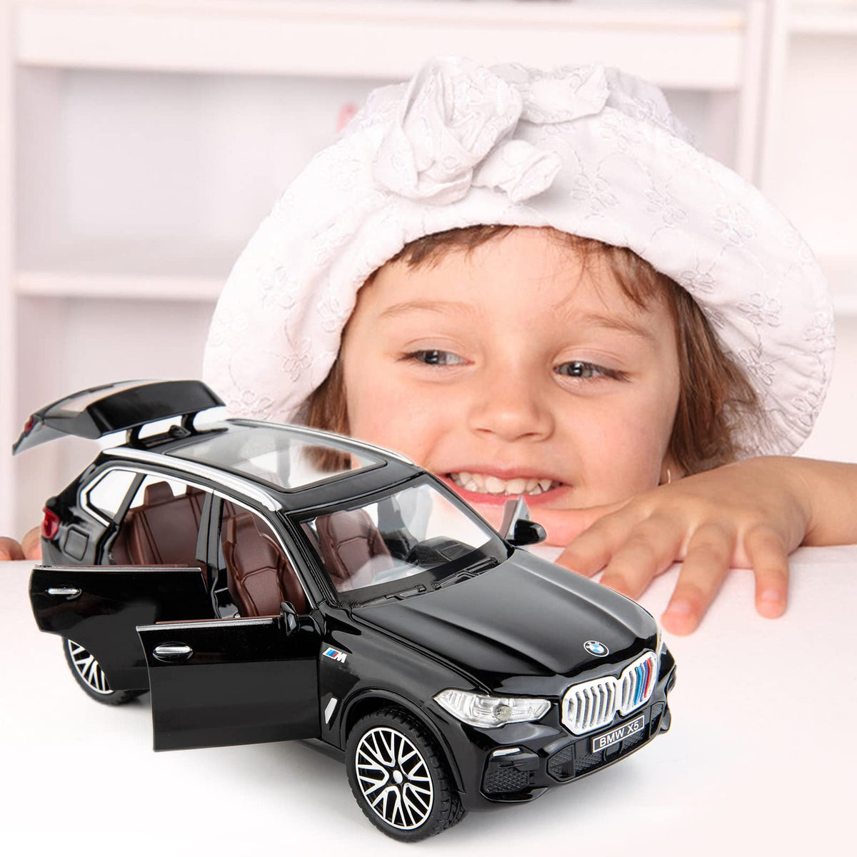 BDTCTK X5 SUV decorative model for desk or shelf display.