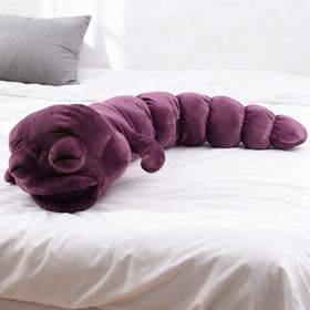 Beego Jujutsu Toji Caterpillar plush on desk scene with gaming setup