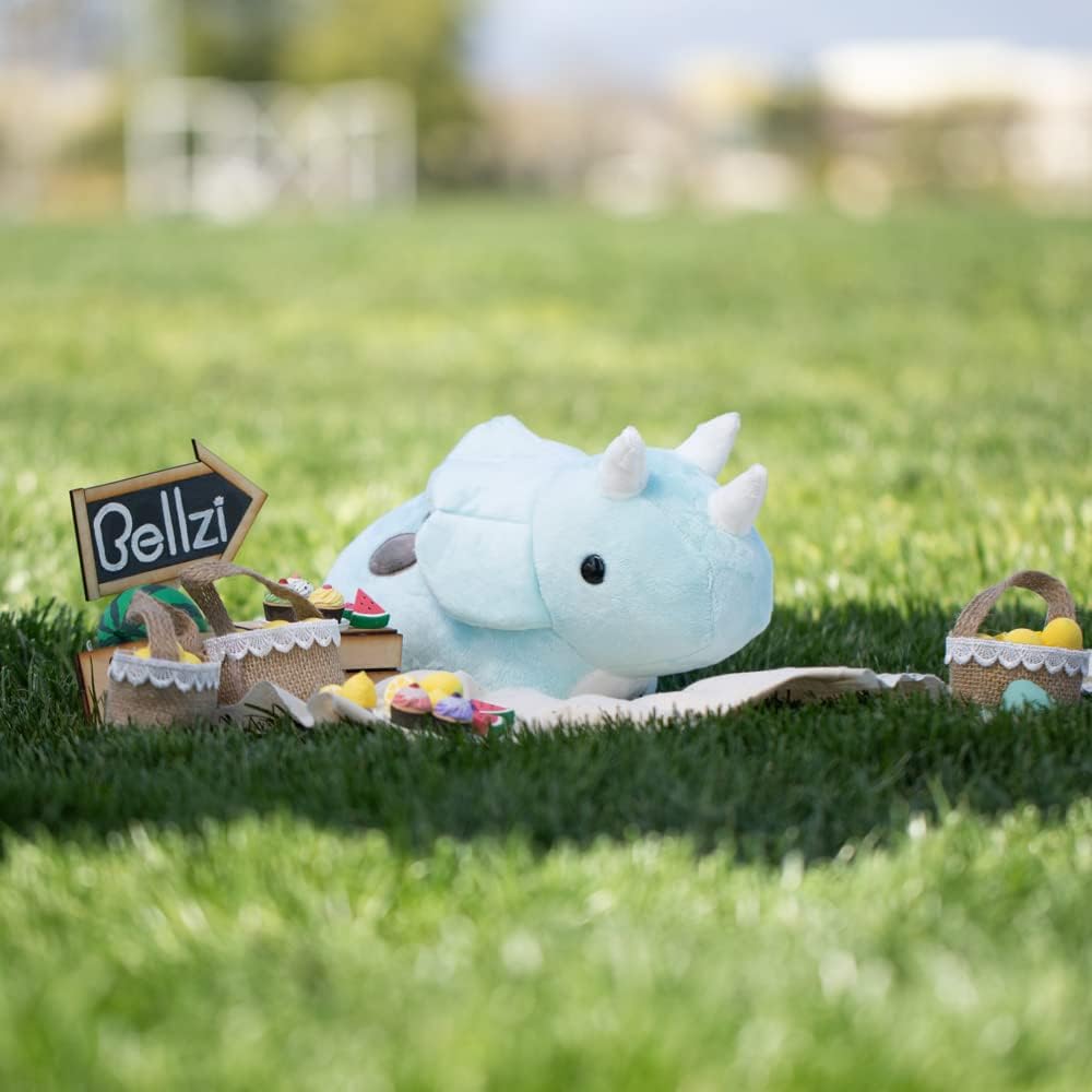 Bellzi Seri Triceratops cuddly plush by the bed supports bedtime routines.