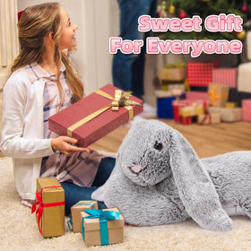 BENINY bunny kid hugging the large plush companion.