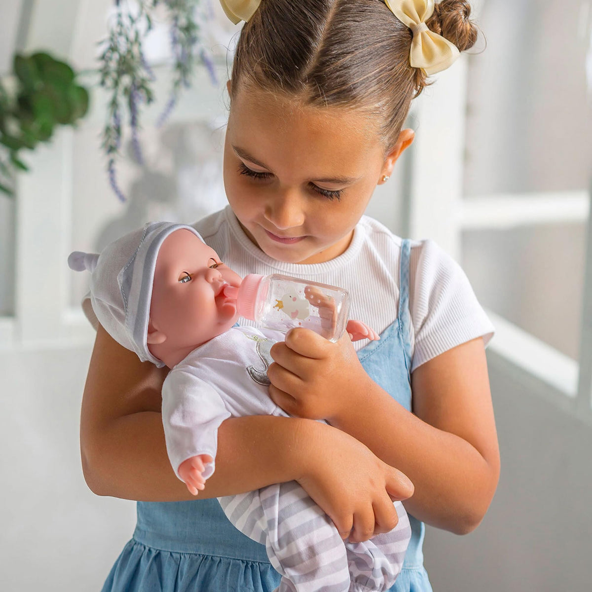 Berenguer Boutique 15in doll with pacifier supports comforting pretend play.