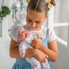 Berenguer Boutique 15in doll with pacifier supports comforting pretend play.