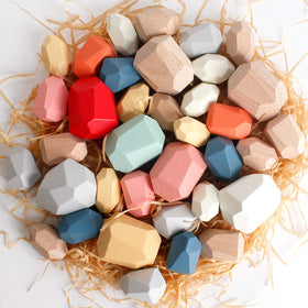 BESTAMTOY wooden stones balance closeup demonstrates precision stacking and concentration