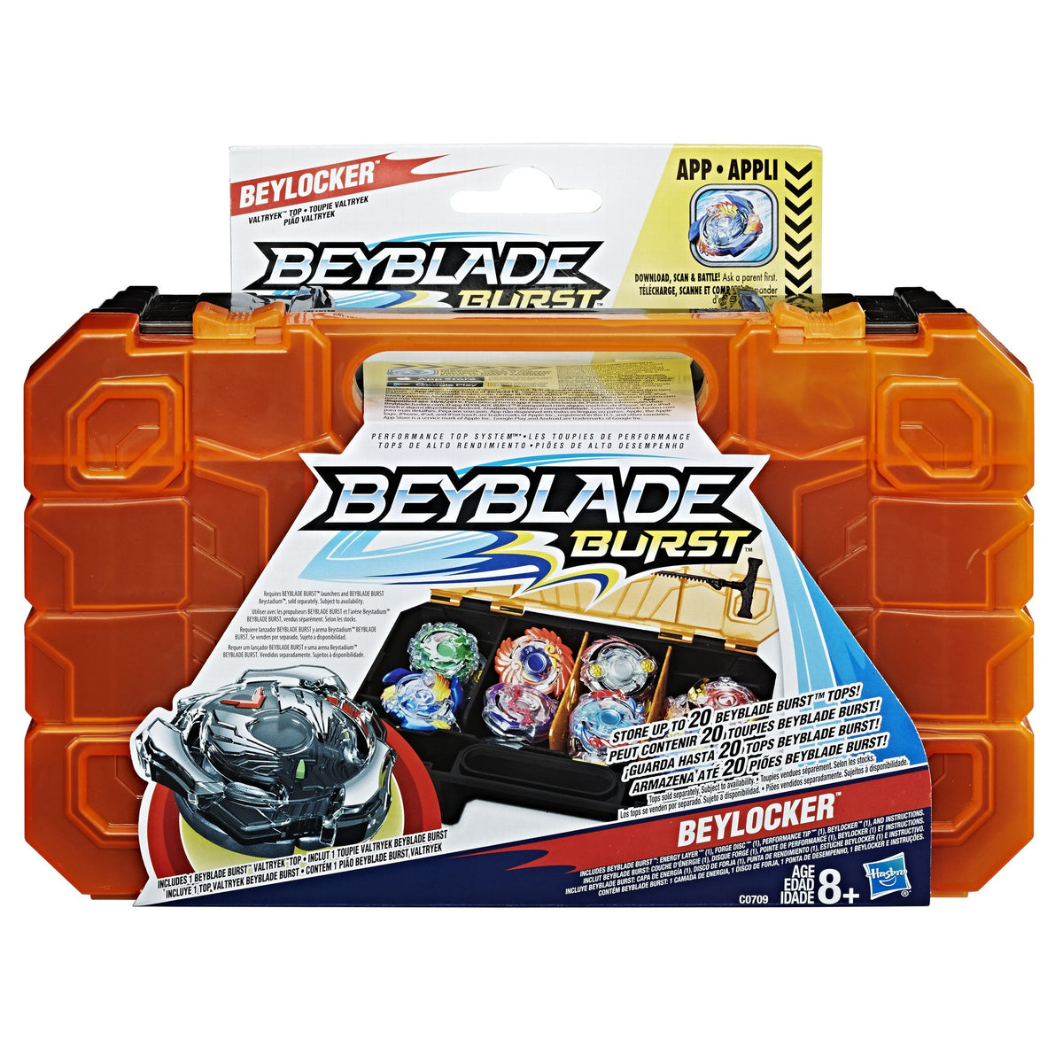 Included Beyblade Burst top with interchangeable parts beside the Beylocker.