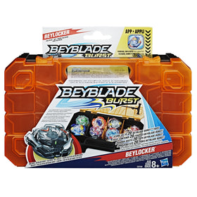 Included Beyblade Burst top with interchangeable parts beside the Beylocker.