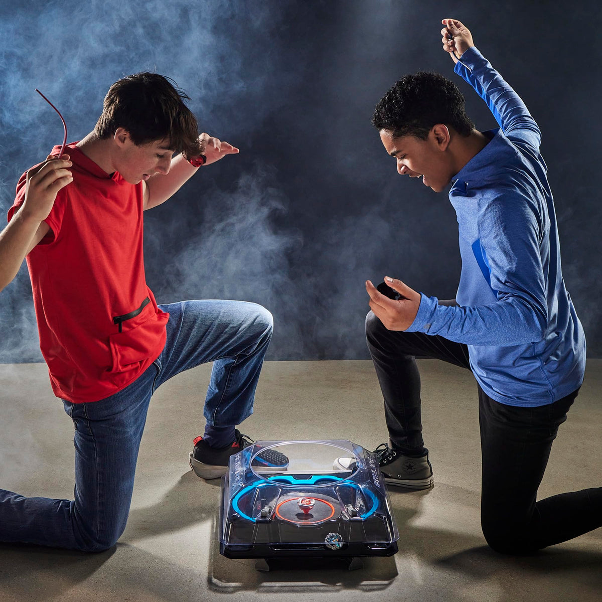 Beyblade BX-00 action captures bursts and crashes during intense play.