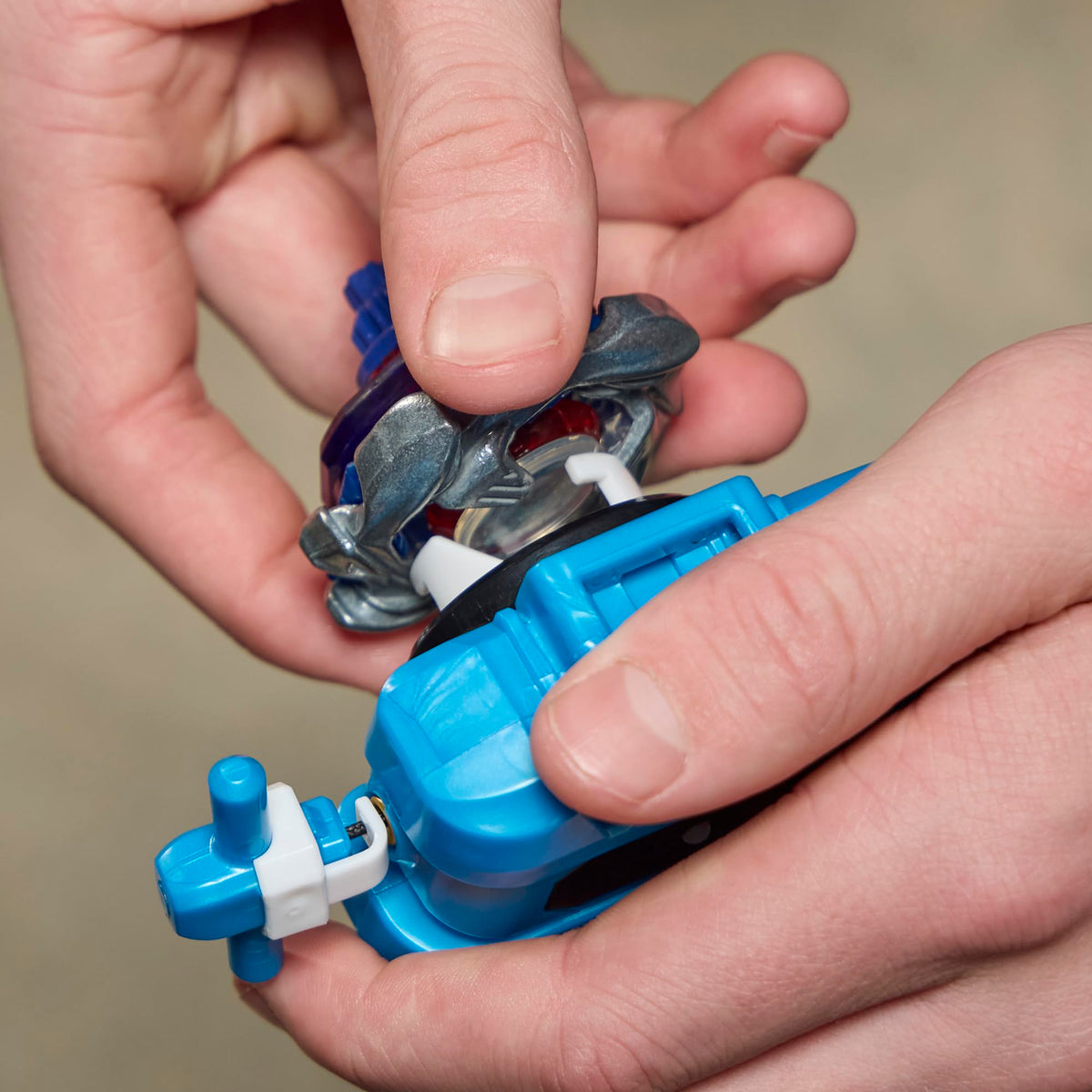 Beyblade X interchangeable blade, ratchet, and bit for customization.