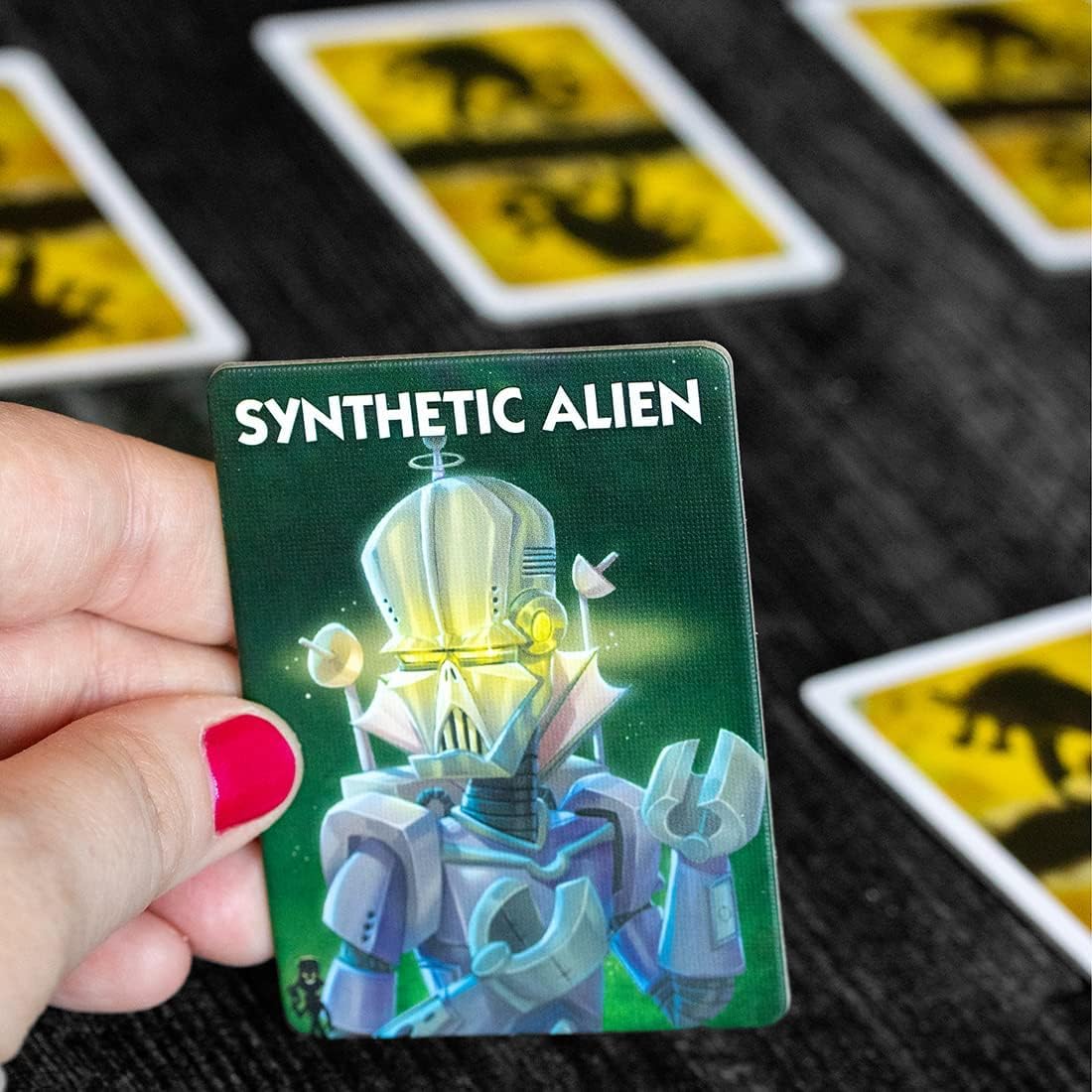 Bezier Games One Night Ultimate Alien packaging emphasizes family-friendly party game for groups