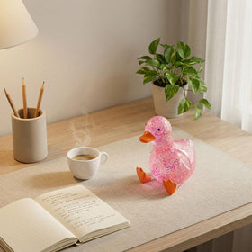 Bicotand squishy duck press-and-release action demonstrates tactile play.
