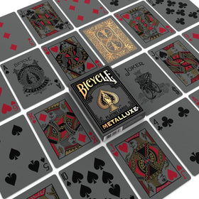 Bicycle Metalluxe Black Gold foil deck close-up for luxury play aesthetics.