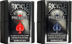 Bicycle Prestige red deck with waterproof plastic cards for durable play.
