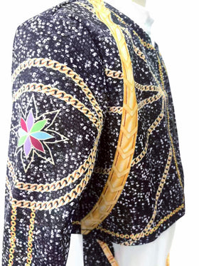 Binbo Rumi golden costume back view highlighting the jacket's sparkle and chain details