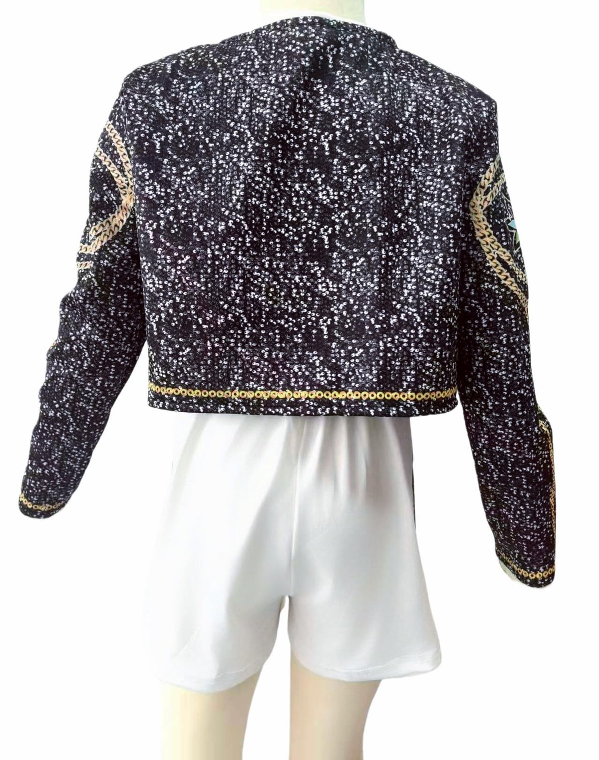 Binbo Rumi shorts with gold waistband adding luxe sparkle to the three-piece look