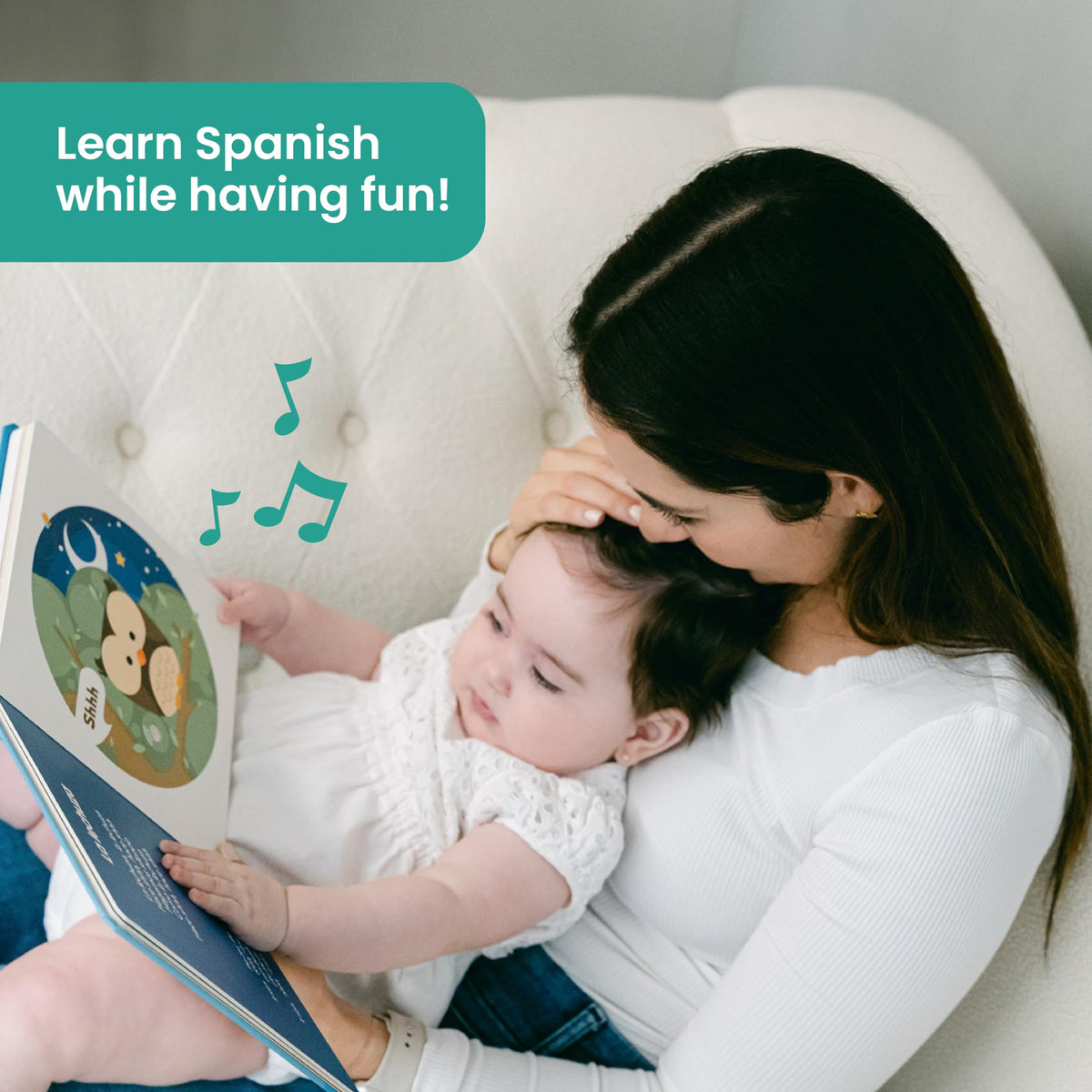 Binibi Estrellita child holding the interactive board book for screen-free play