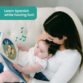 Binibi Estrellita child holding the interactive board book for screen-free play