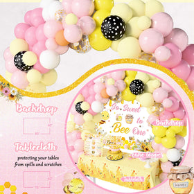 Birhgt gold glitter balloons pack adds celebratory sparkle to the bee-themed setup.
