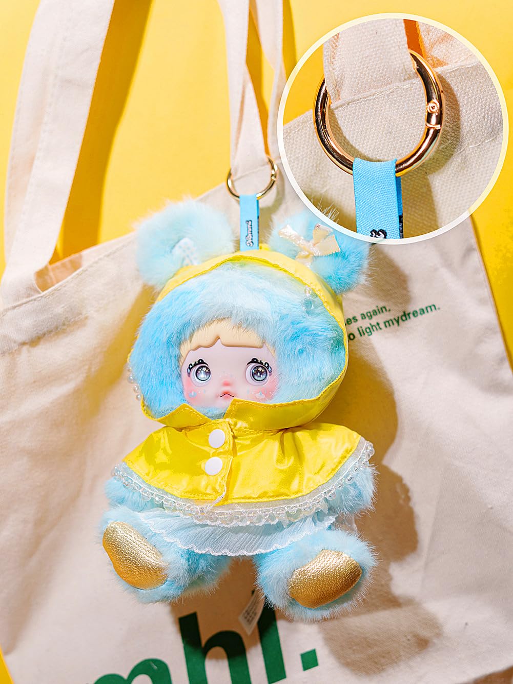 Nommi plush attached to keys or bags as a cute portable charm.