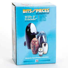 Bits and Pieces walrus nesting doll, smooth wood with warm tones for decor.