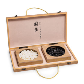 Black Long Di Fang imitation jade Go pieces black 2.2 cm with tactile feel.