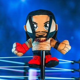 Bleacher Creatures Roman Reigns plush fabric close-up showing velvet texture