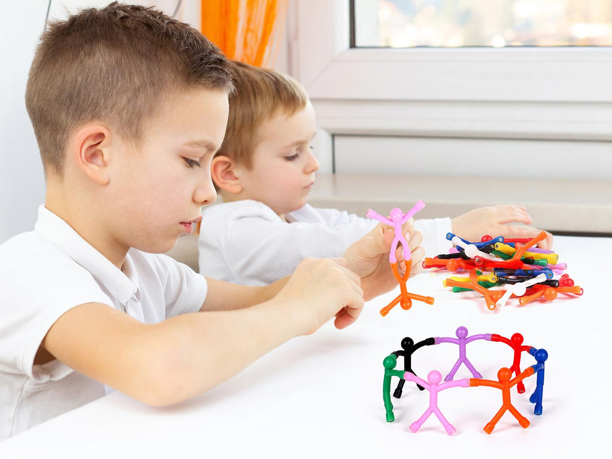 BlissfulTie fridge magnets with figurines decorate surfaces while inspiring play.