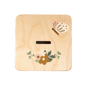 BloomOwl handmade in USA tag on piggy bank reinforces craftsmanship.