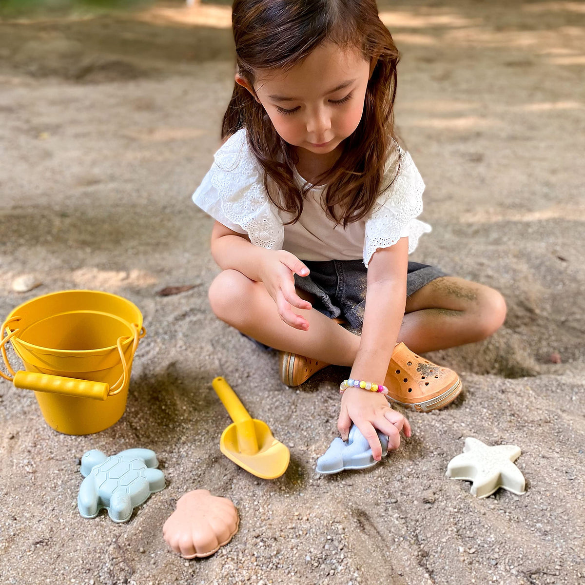 BLUE GINKGO cotton travel bag keeps sand toys organized on the go