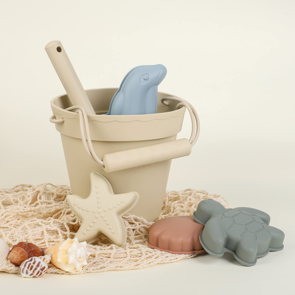 BLUE GINKGO dolphin mold creates playful sea creature shapes during sand play.