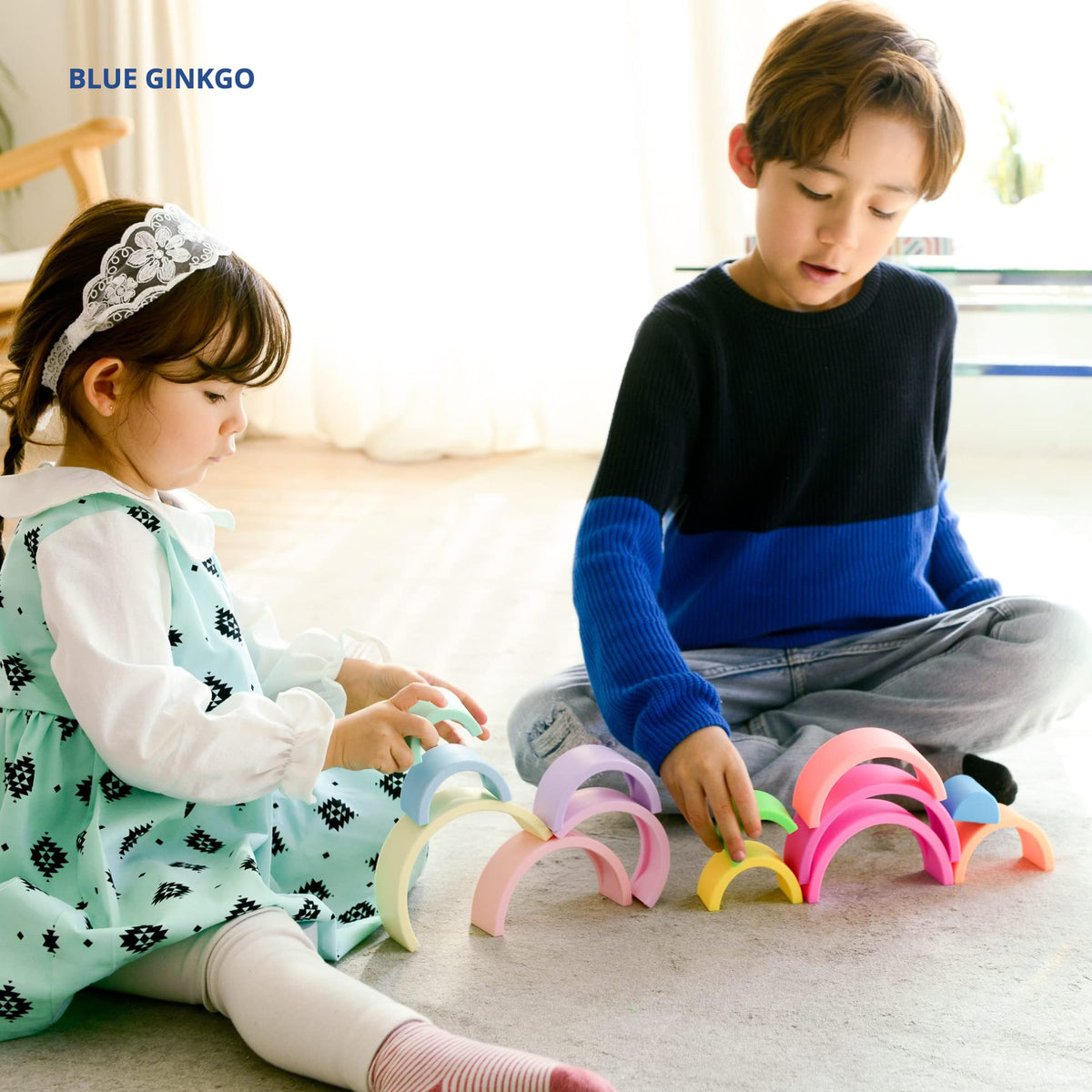 BLUE GINKGO 10-layer rainbow stacker encourages open-ended learning.