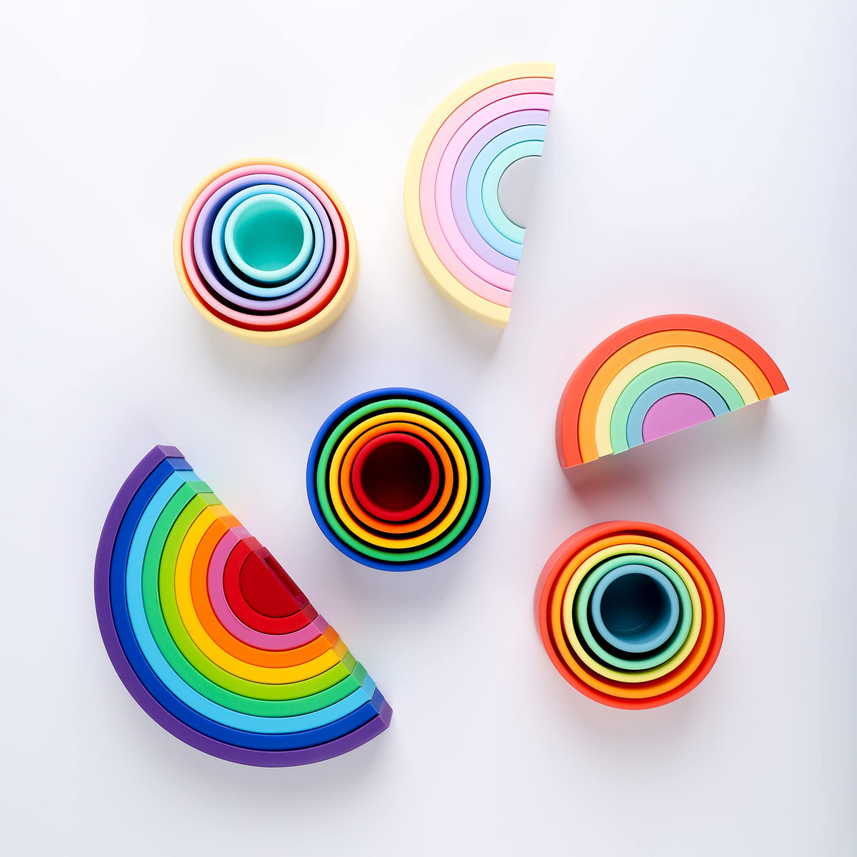 BLUE GINKGO vibrant rainbow stacker for Montessori-inspired playtime.