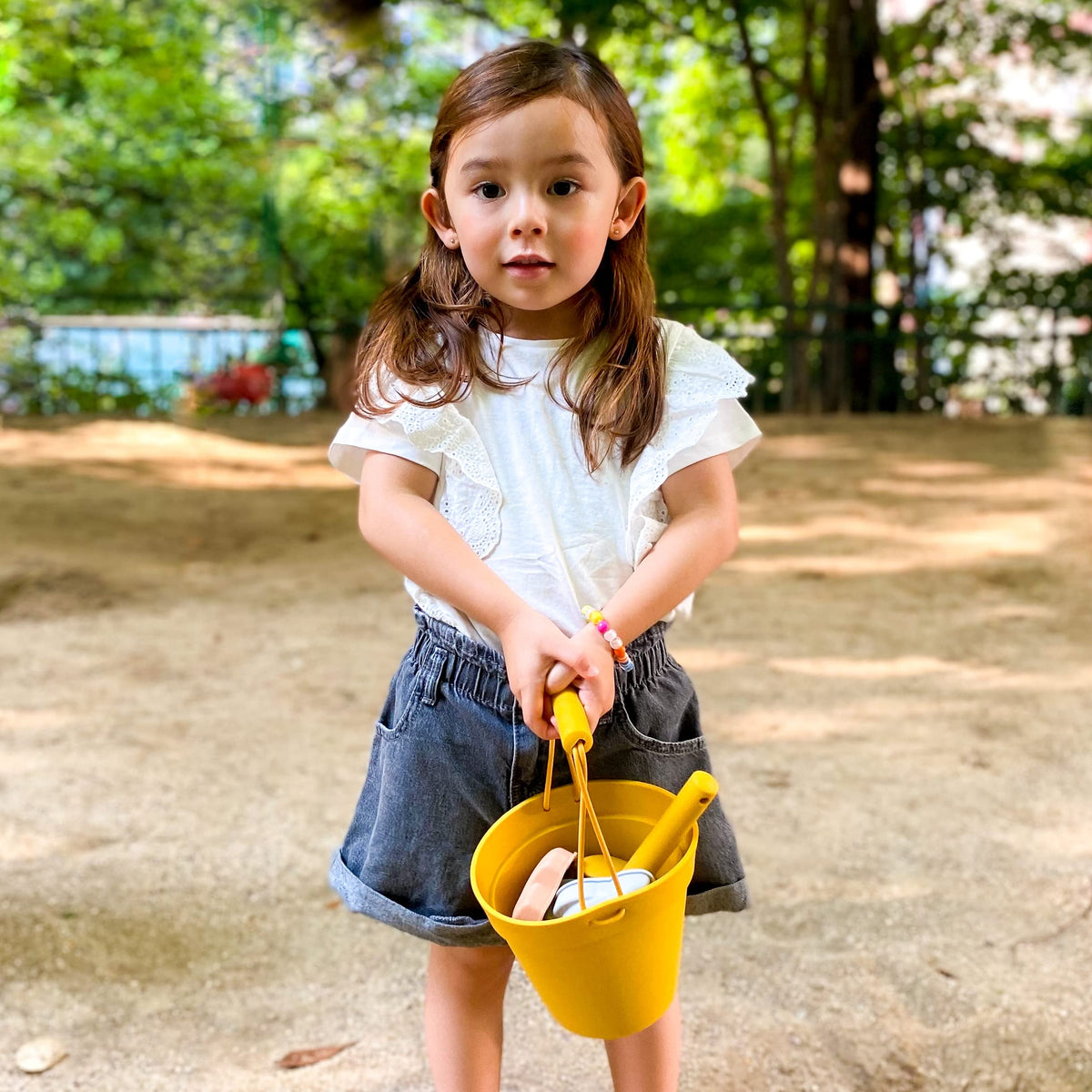 Blue Ginkgo silicone shovel ideal for scooping sand and learning fine motor skills.